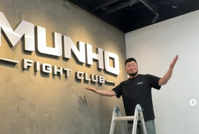 Mun Ho Park poses in front of Munho Fight Club