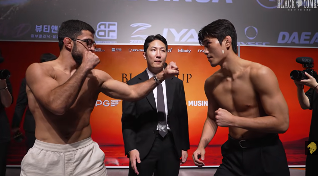 Hyuk Min Ji face off with Brown Bear 
