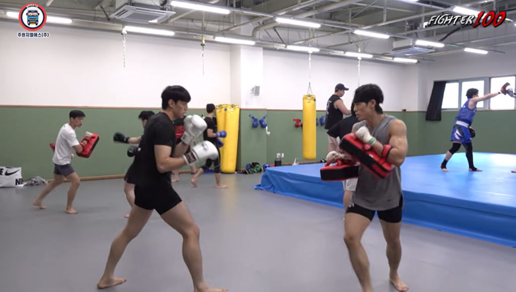 A Sol Kwon takes team to Wushu Sanda team