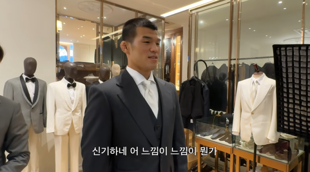 Seok Hyeon Ko gets fitted for his suit